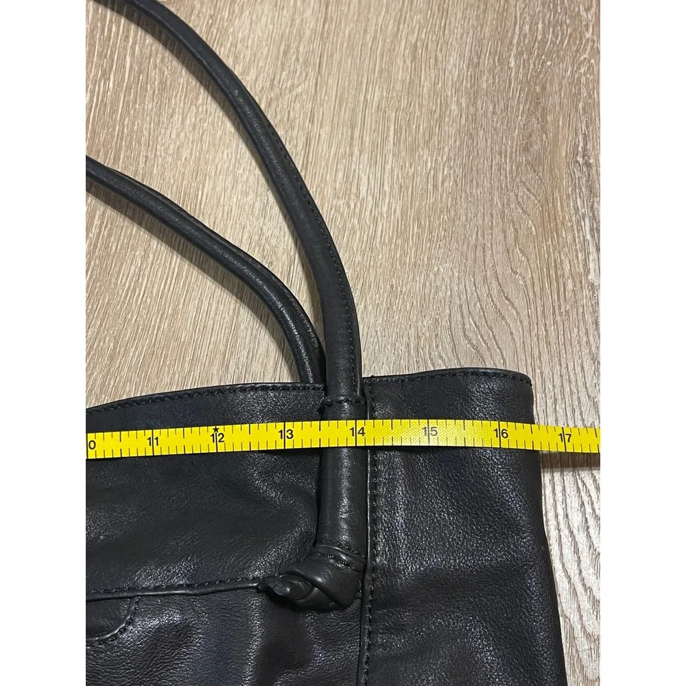 Hobo Black Top Grain Leather Tassel Tote Bag Rolled Straps and Exterior Pocket